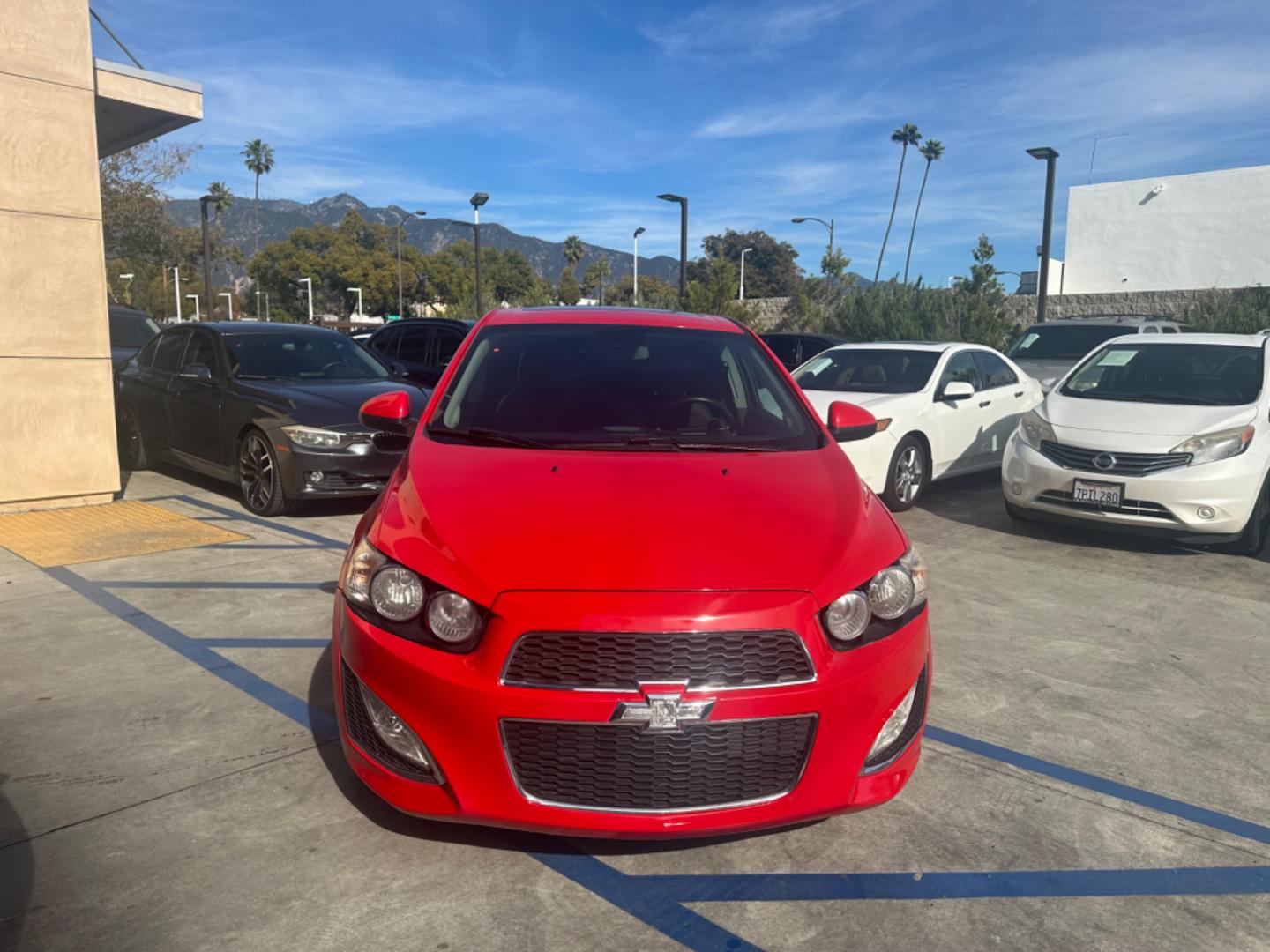 2013 Red /Black Chevrolet Sonic Cloth (1G1JG6SB3D4) with an 4 CYLINDER engine, Automatic transmission, located at 30 S. Berkeley Avenue, Pasadena, CA, 91107, (626) 248-7567, 34.145447, -118.109398 - The 2013 Chevrolet Sonic RS Auto 5-Door is a standout choice for drivers seeking a blend of style, performance, and practicality. At our Pasadena, CA dealership, we specialize in offering a wide array of used BHPH (Buy Here Pay Here) cars, including the dynamic Chevrolet Sonic RS. This detailed guid - Photo#5